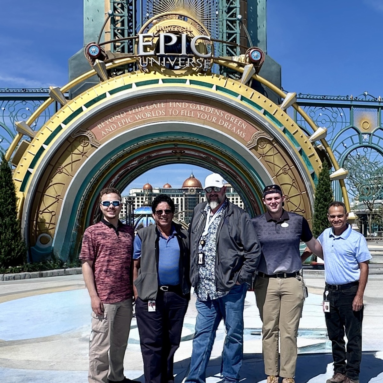 Wireless systems team in front of The Chronos at Epic Universe